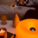 Bordlampe i glas med donutform