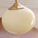 Bordlampe i metal og glas med marshmallow-form