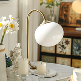 Bordlampe i metal og glas med marshmallow-form