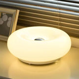 Bordlampe i glas med donutform