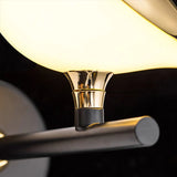 Moderne LED-væglampe i guld med fuglemotiv