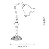 Bordlampe i messing med blomstermotiv