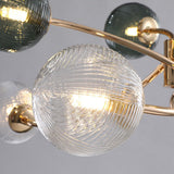 LED-lysekrone i jern og glas med guld – moderne loftlampe til stuen