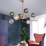 LED-lysekrone i jern og glas med guld – moderne loftlampe til stuen