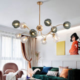 LED-lysekrone i jern og glas med guld – moderne loftlampe til stuen