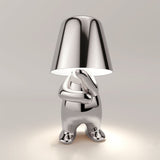 Bordlampe med figurmotiv – genopladelig stemningslampe i guld og sølv