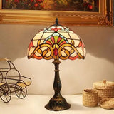 Bordlampe i Tiffany-glas med justerbar hals – art deco skrivebordslampe