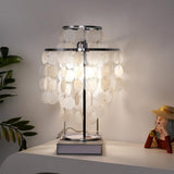 Bordlampe i metal med muslinge- og perlemotiv