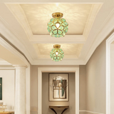 Loftlampe i glas med blomsterform – dekorativ plafond til stuen
