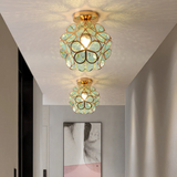Loftlampe i glas med blomsterform – dekorativ plafond til stuen