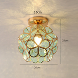Loftlampe i glas med blomsterform – dekorativ plafond til stuen