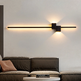 Væglampe i aflang form – minimalistisk LED-belysning til stuen
