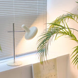 Bordlampe i hvidt glas med skiveform – moderne