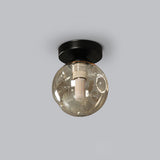 Loftlampe med glaskugle – nordisk loftbelysning
