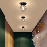 Loftlampe med glaskugle – nordisk loftbelysning