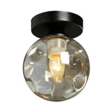 Loftlampe med glaskugle – nordisk loftbelysning