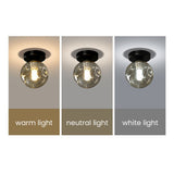 Loftlampe med glaskugle – nordisk loftbelysning