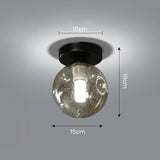 Loftlampe med glaskugle – nordisk loftbelysning