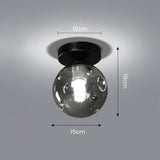 Loftlampe med glaskugle – nordisk loftbelysning