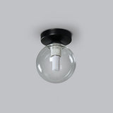 Loftlampe med glaskugle – nordisk loftbelysning