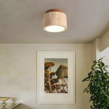 Loftlampe i travertin med trædetalje – cylinderformet plafond