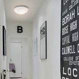 Loftlampe formet som en musling i cremehvid – vintage loftbelysning